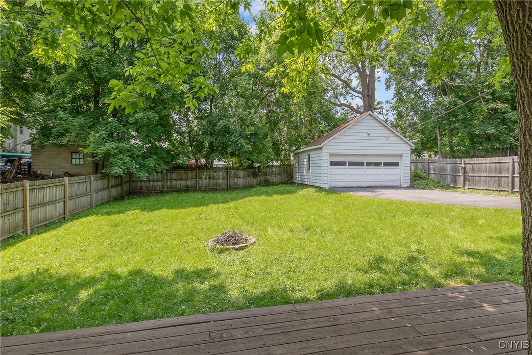 237 Sunstruck Drive Syracuse, NY 13206 - Photo 35 of 39 Fully Fenced Back Yard With a Two Car Garage.