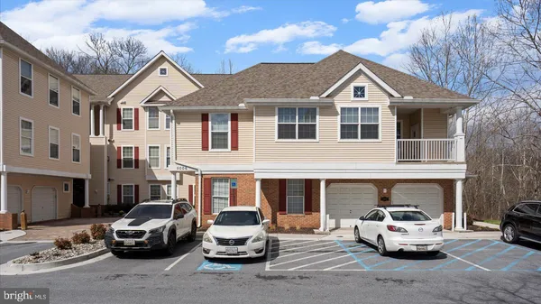 a car parked in front of a house