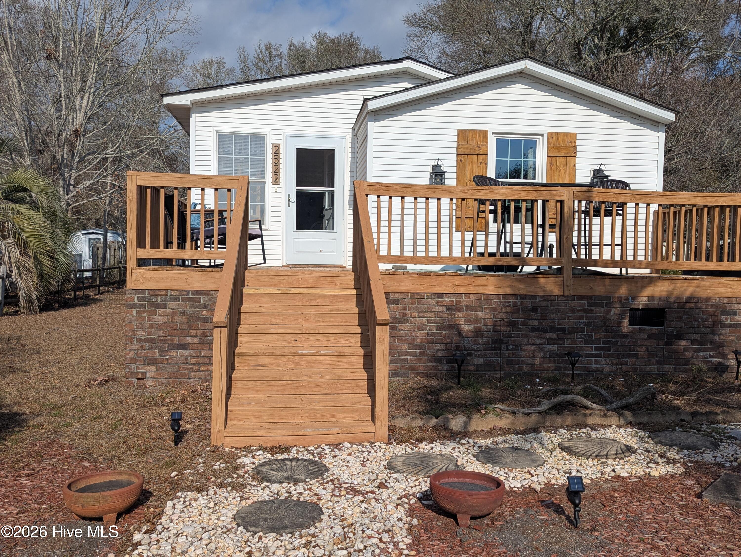 2522 Gator Lane Southwest Supply, NC 28462 - Photo 2 of 45 front deck