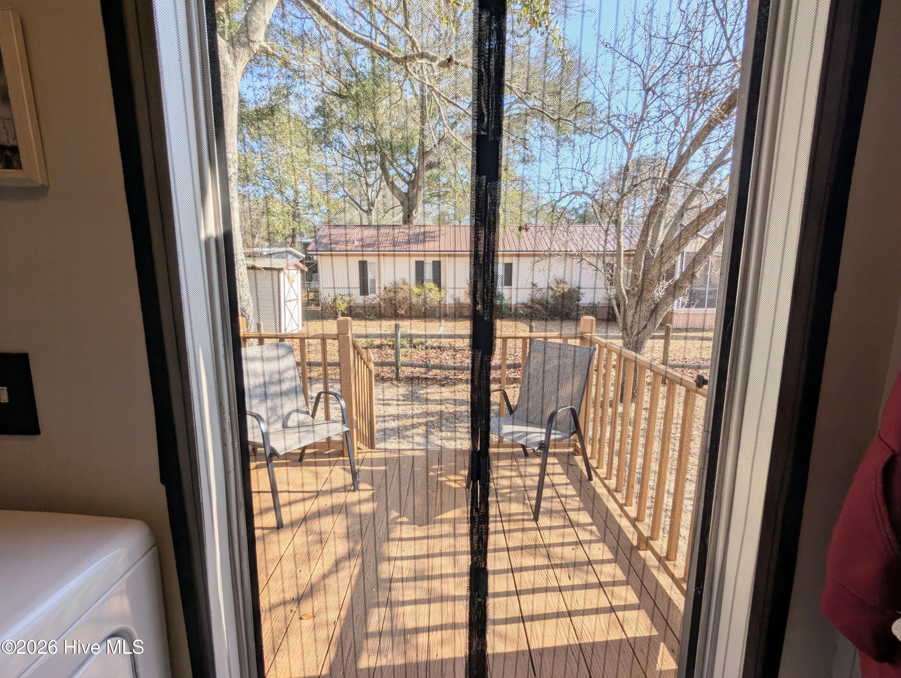 2522 Gator Lane Southwest Supply, NC 28462 - Photo 30 of 45 screen curtain to side deck