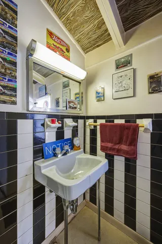 a view of a chairs and table in the patio