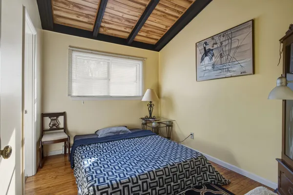 a bathroom with a sink a vanity and a window