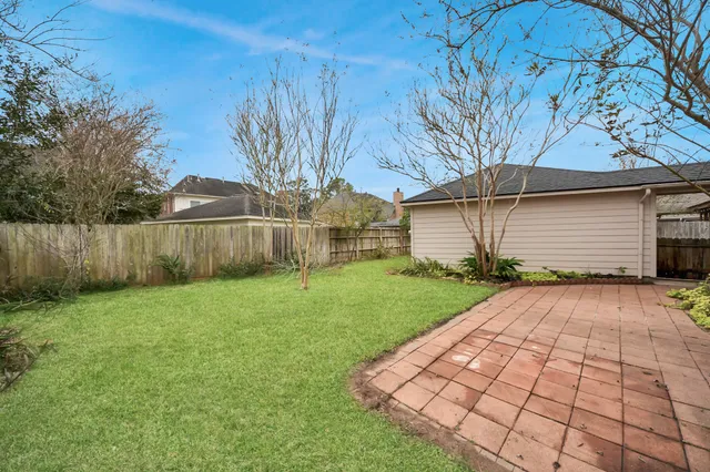 a front view of a house with yard