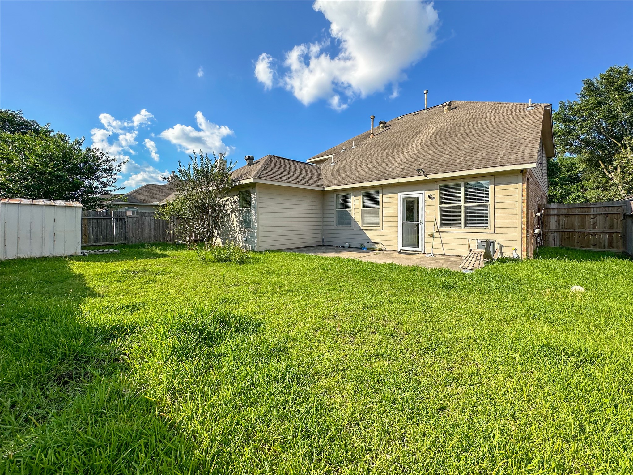 20319 Little Wing Drive Spring, TX 77388 - Photo 48 of 49 a view of a house with a yard and a garden