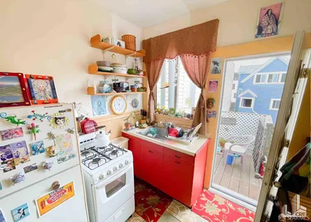 a room with toys and dresser