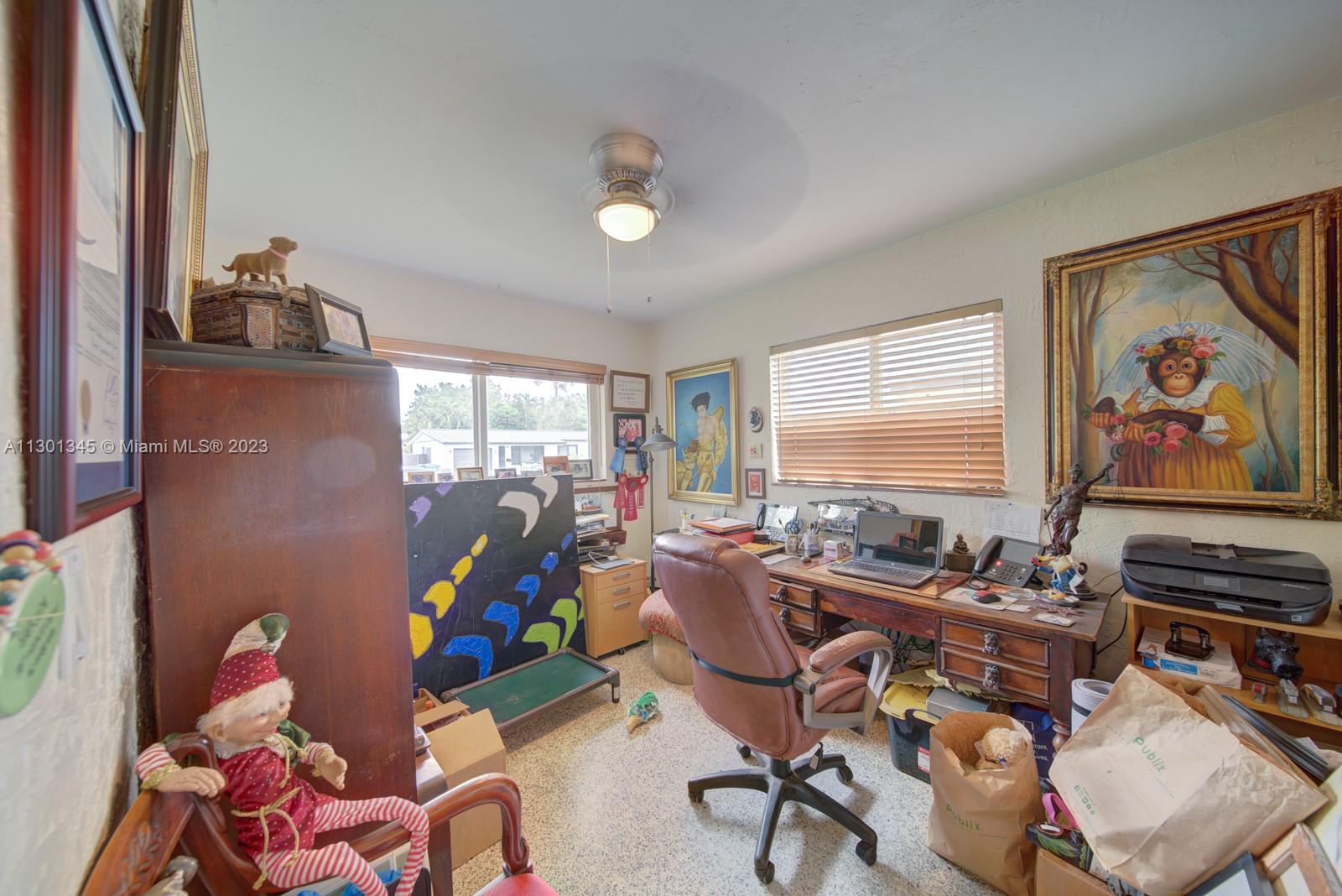 9520 April Road Cutler Bay, FL 33157 - Photo 16 of 26 a work room with furniture and window