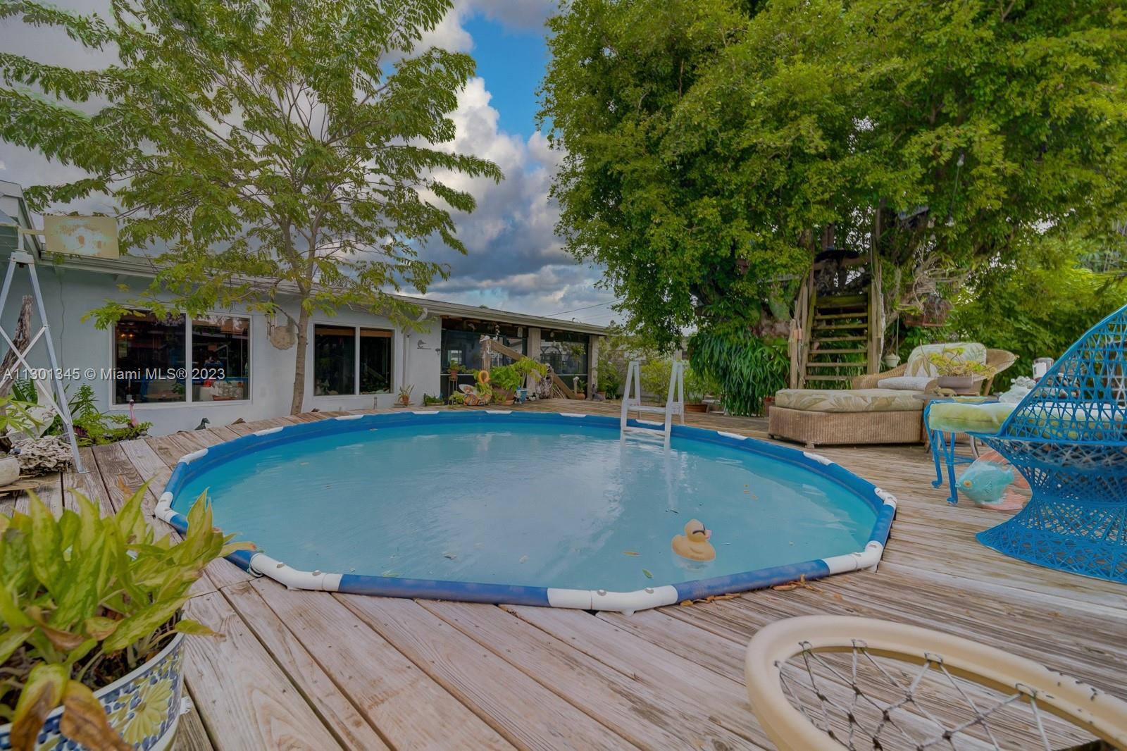 9520 April Road Cutler Bay, FL 33157 - Photo 4 of 26 a view of outdoor space yard deck and swimming pool