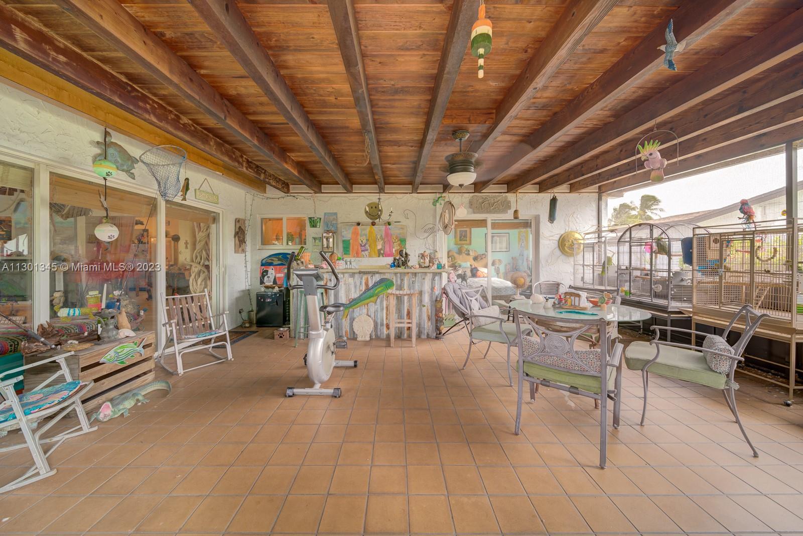 9520 April Road Cutler Bay, FL 33157 - Photo 10 of 26 a view of a studio with wooden floor