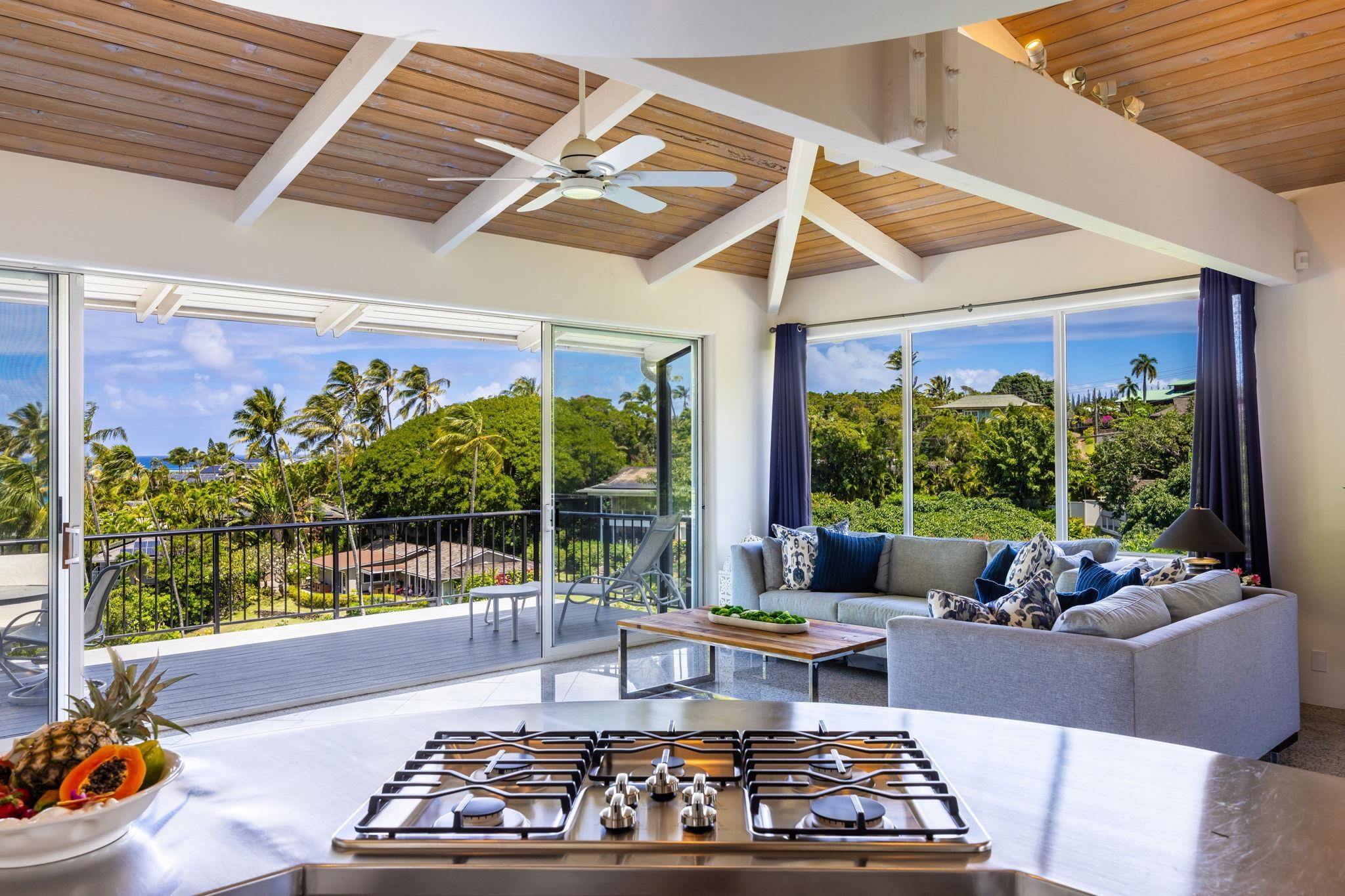 5045 Lower Honoapiilani Road, Unit 9 Lahaina, HI 96761 - Photo 18 of 50 a living room with furniture and a large window
