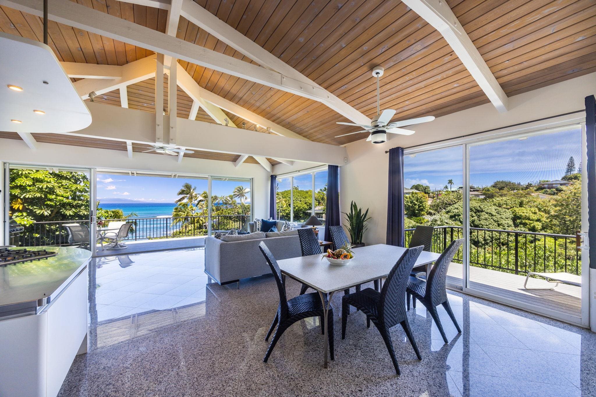 5045 Lower Honoapiilani Road, Unit 9 Lahaina, HI 96761 - Photo 22 of 50 a view of a dining room with furniture and window