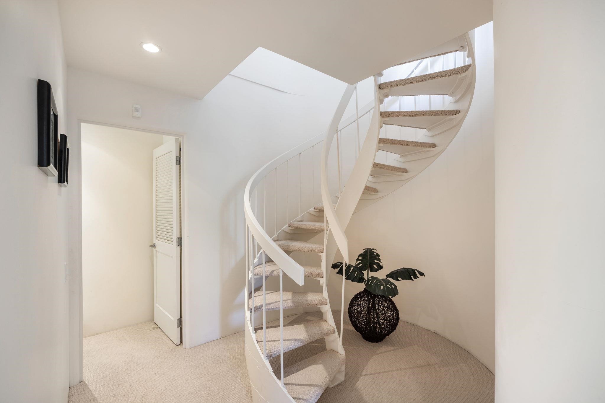 5045 Lower Honoapiilani Road, Unit 9 Lahaina, HI 96761 - Photo 32 of 50 a view of staircase with white walls