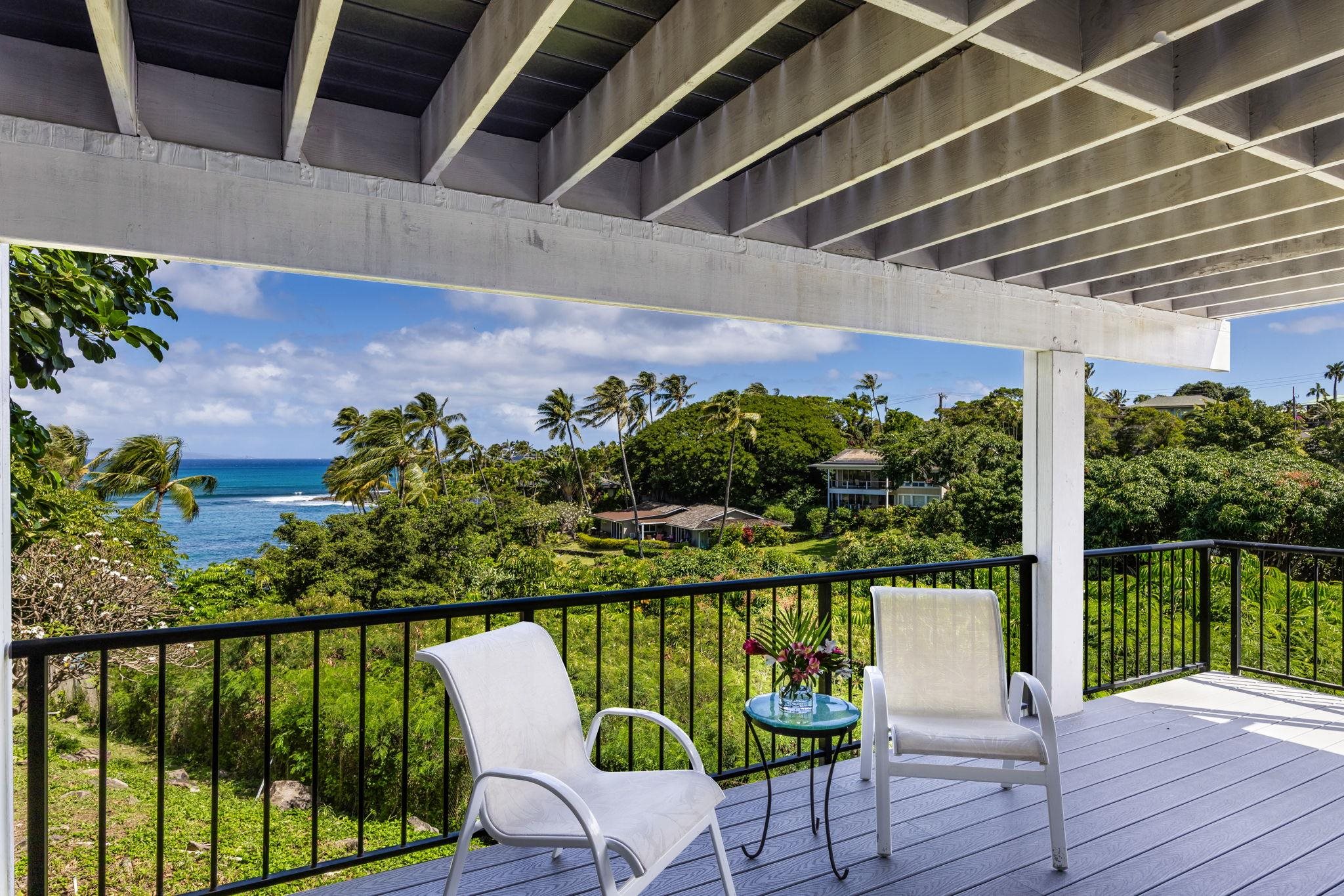 5045 Lower Honoapiilani Road, Unit 9 Lahaina, HI 96761 - Photo 33 of 50 a view of a chairs in a balcony