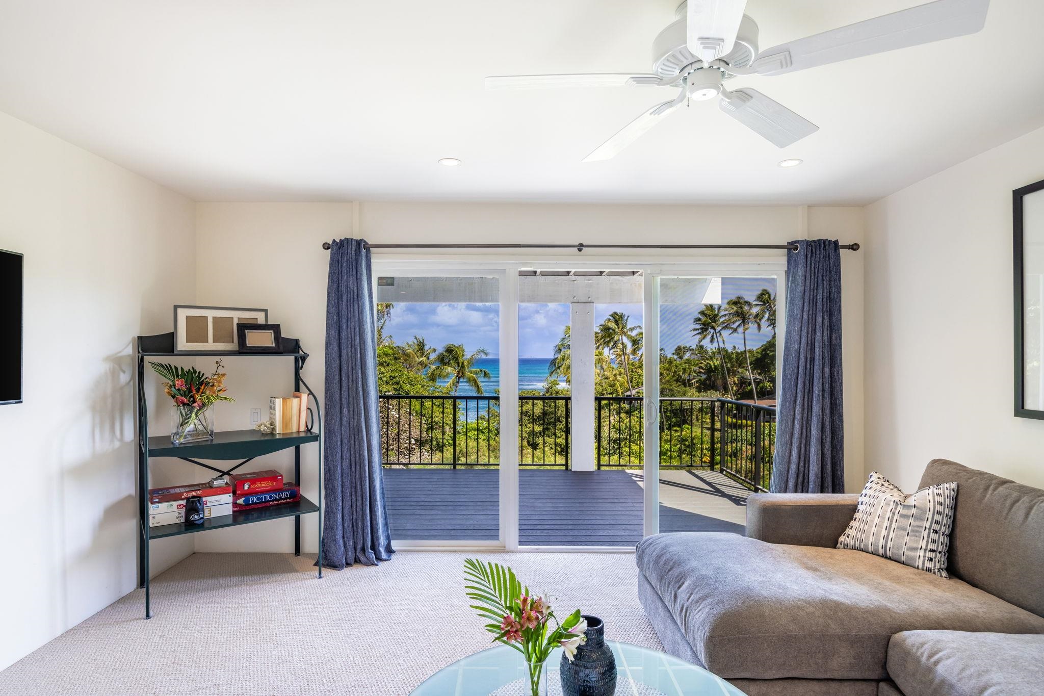 5045 Lower Honoapiilani Road, Unit 9 Lahaina, HI 96761 - Photo 34 of 50 a bedroom with furniture and a window