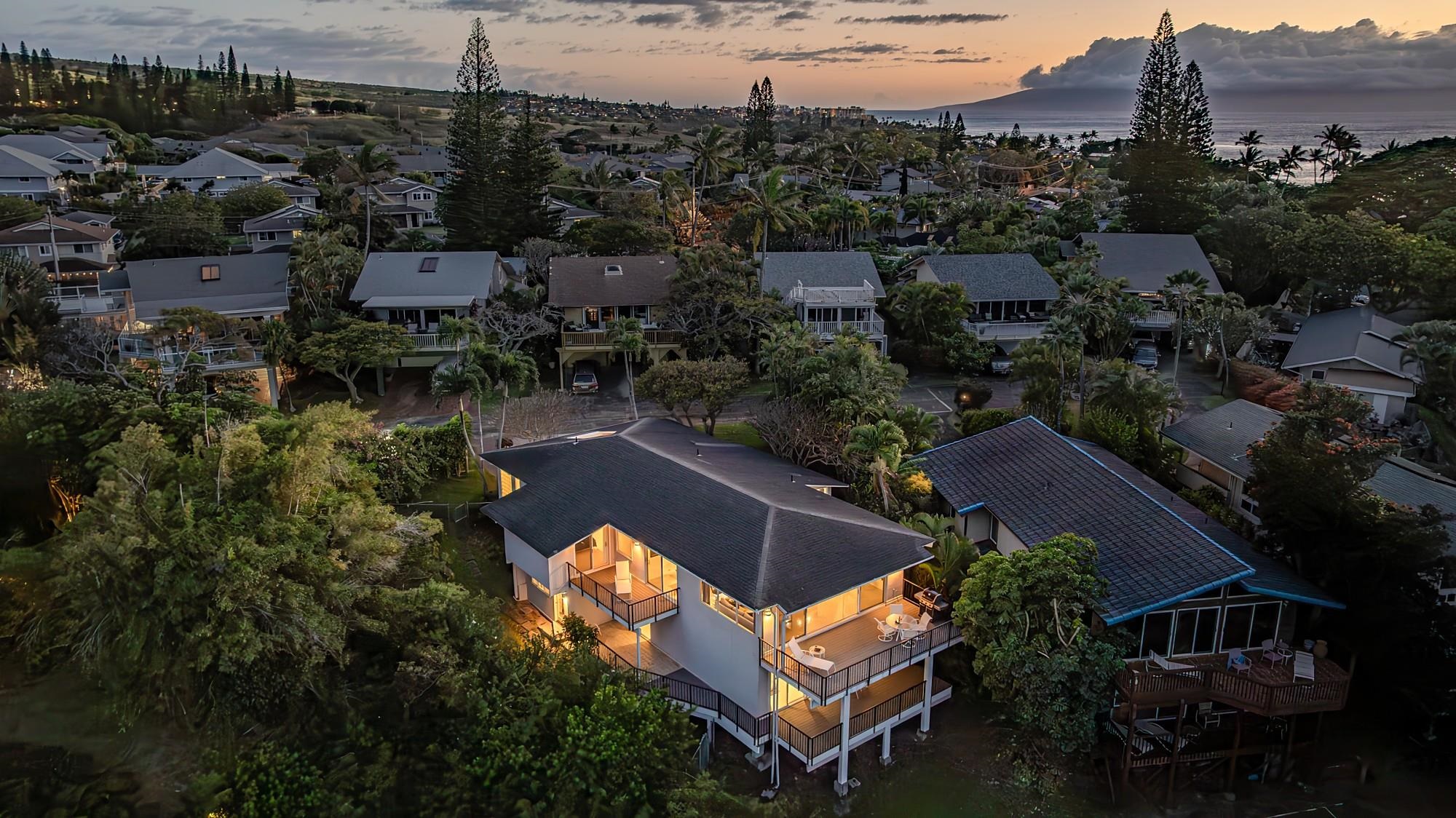 5045 Lower Honoapiilani Road, Unit 9 Lahaina, HI 96761 - Photo 10 of 50 an aerial view of a house with a garden