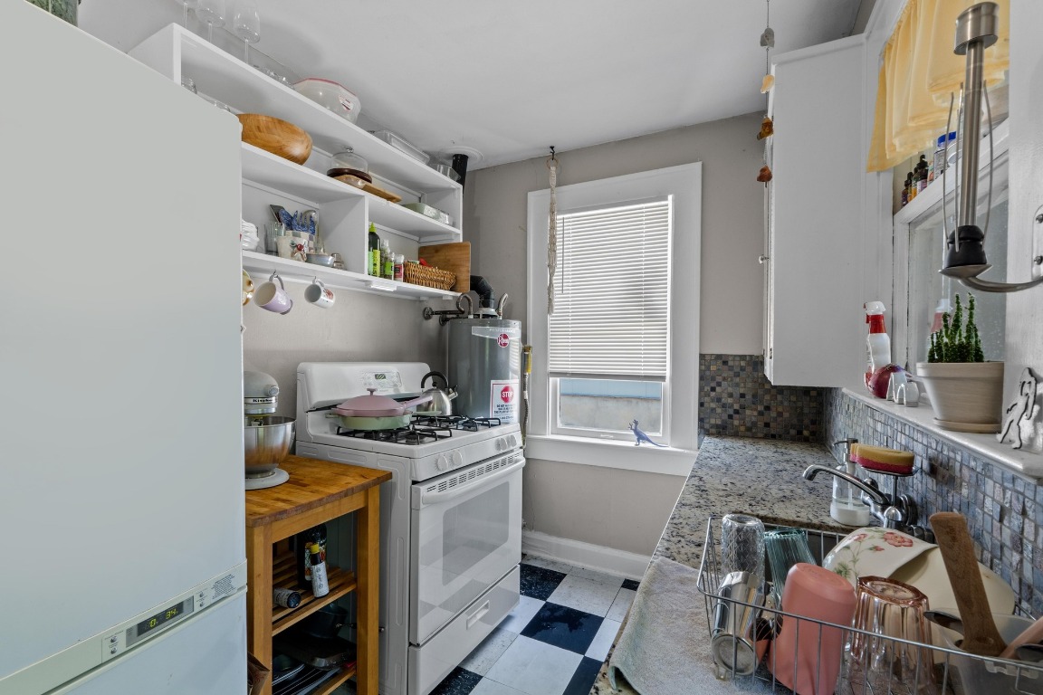 504 East 38th 1/2 Street Austin, TX 78751 - Photo 12 of 29 a storage room with washer and dryer