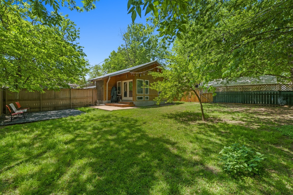 504 East 38th 1/2 Street Austin, TX 78751 - Photo 2 of 29 a backyard of a house with lots of green space