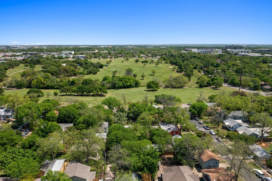 504 East 38th 1/2 Street Austin, TX 78751 - Photo 28 of 29 a view of a green field with lots of bushes