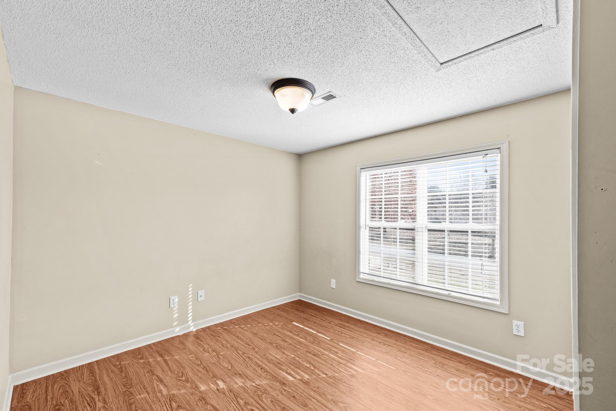 2244 Burris Road Conover, NC 28613 - Photo 20 of 38 an empty room with a empty space and windows