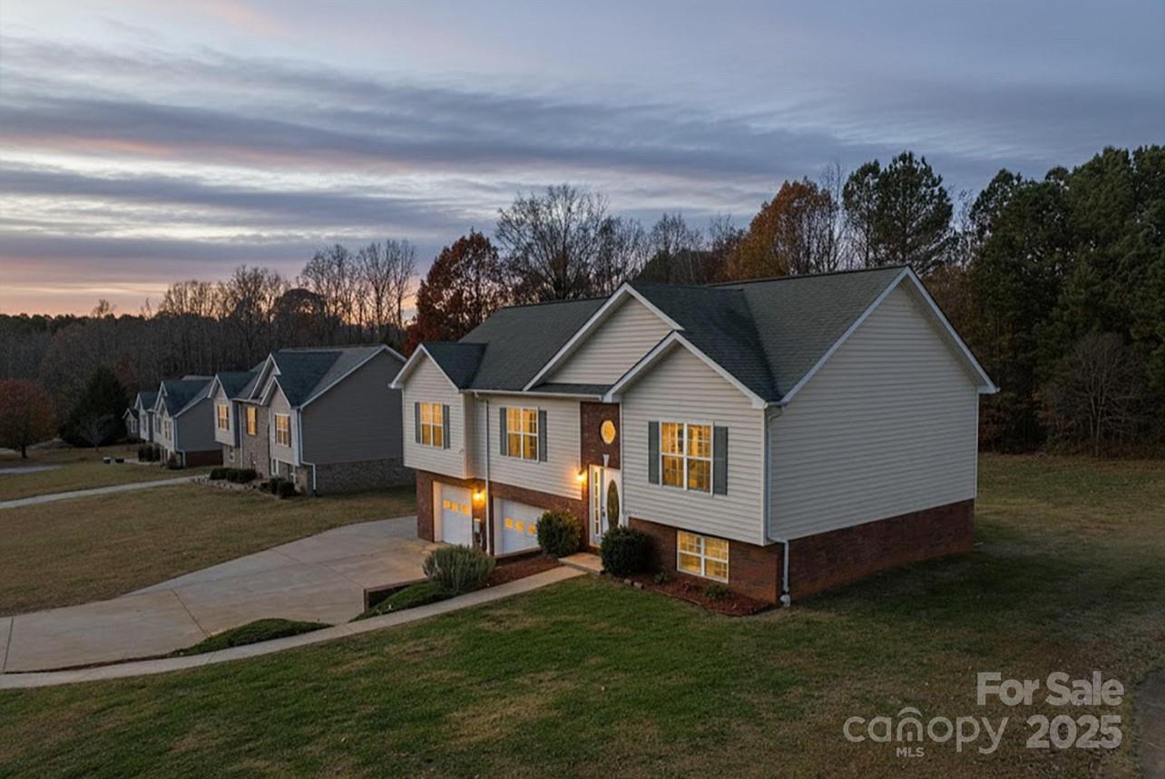 2244 Burris Road Conover, NC 28613 - Photo 2 of 38 a view of a house with a yard