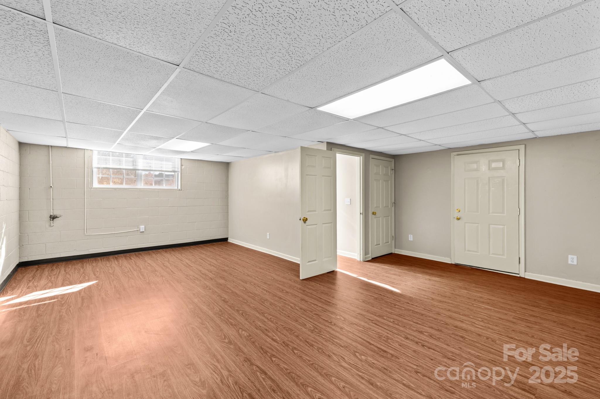 2244 Burris Road Conover, NC 28613 - Photo 25 of 38 an empty room with wooden floor