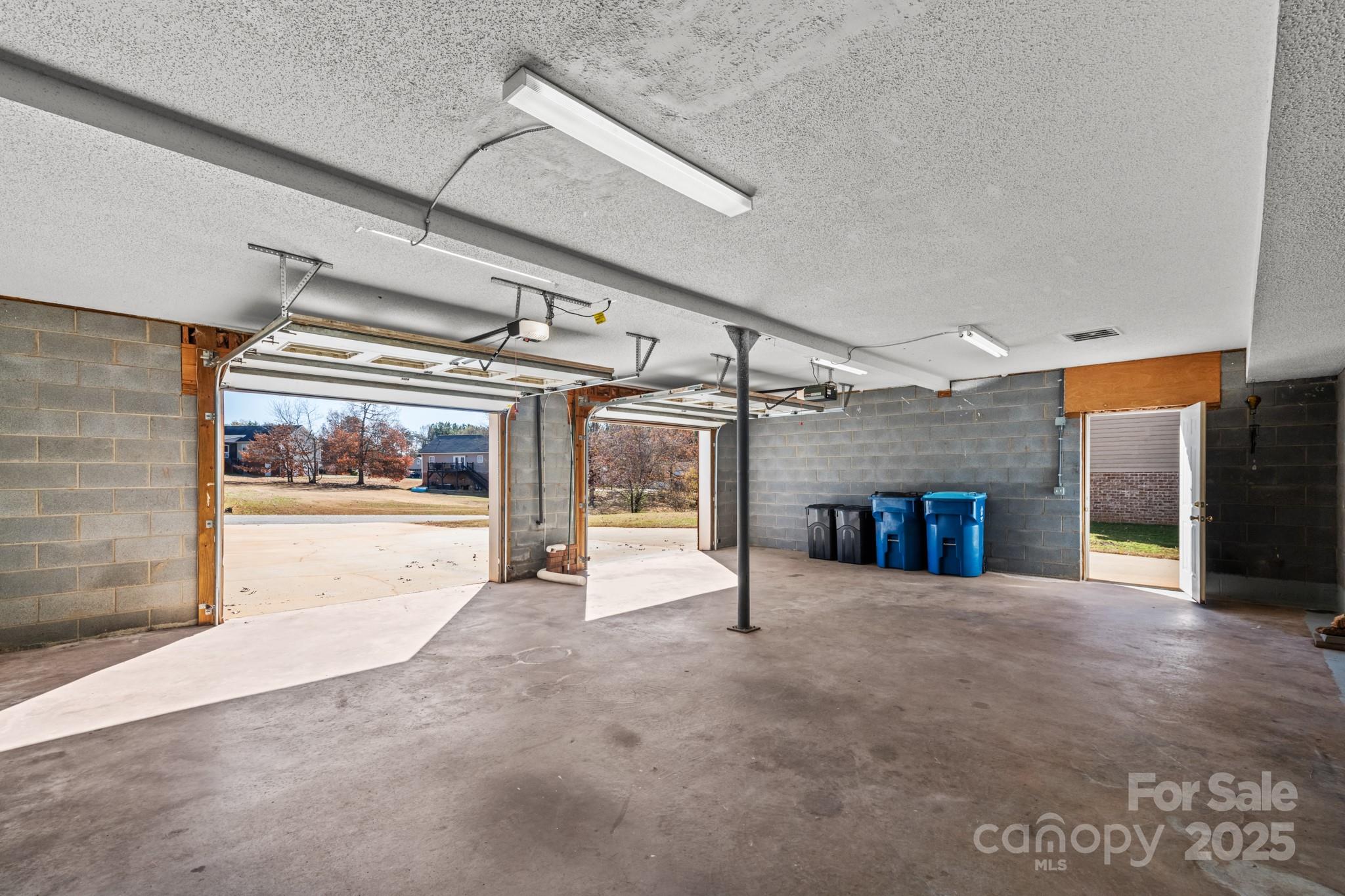 2244 Burris Road Conover, NC 28613 - Photo 26 of 38 a view of an empty room with a fireplace and a window