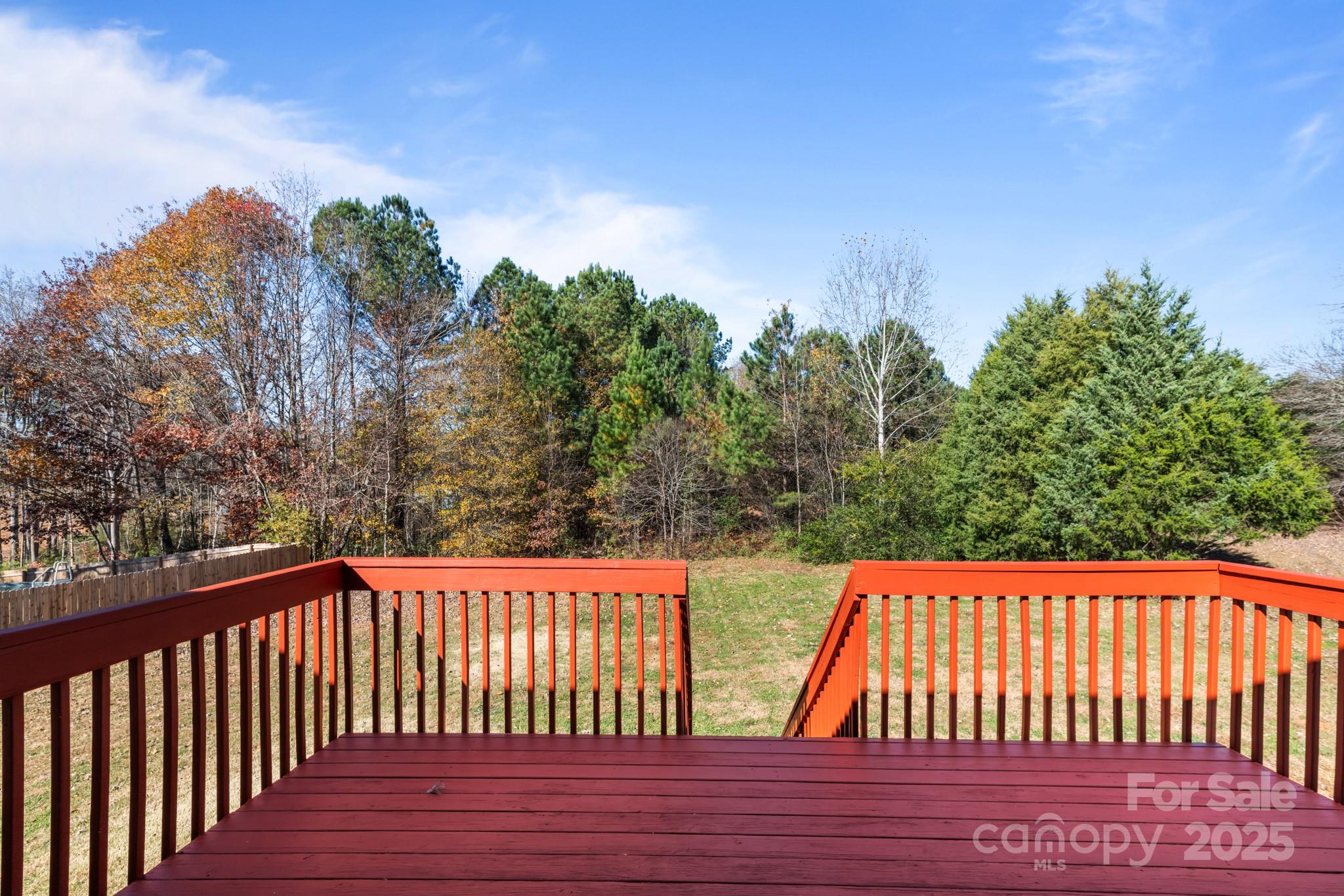 2244 Burris Road Conover, NC 28613 - Photo 27 of 38 a balcony with wooden floor and yard in the back