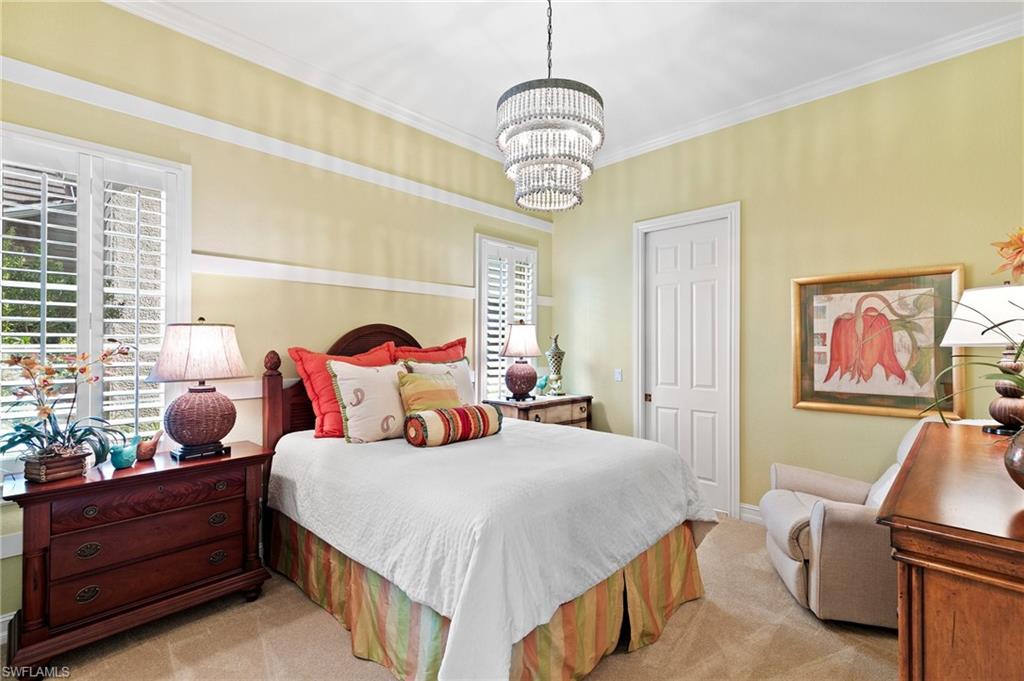 8536 Mallards Way Naples, FL 34114 - Photo 26 of 49 a bedroom with bed and a window