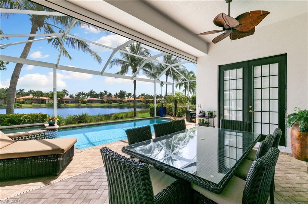 8536 Mallards Way Naples, FL 34114 - Photo 31 of 49 a view of a patio with couches chairs dining table and chairs