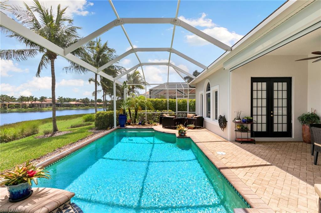 8536 Mallards Way Naples, FL 34114 - Photo 34 of 49 a view of a backyard with swimming pool