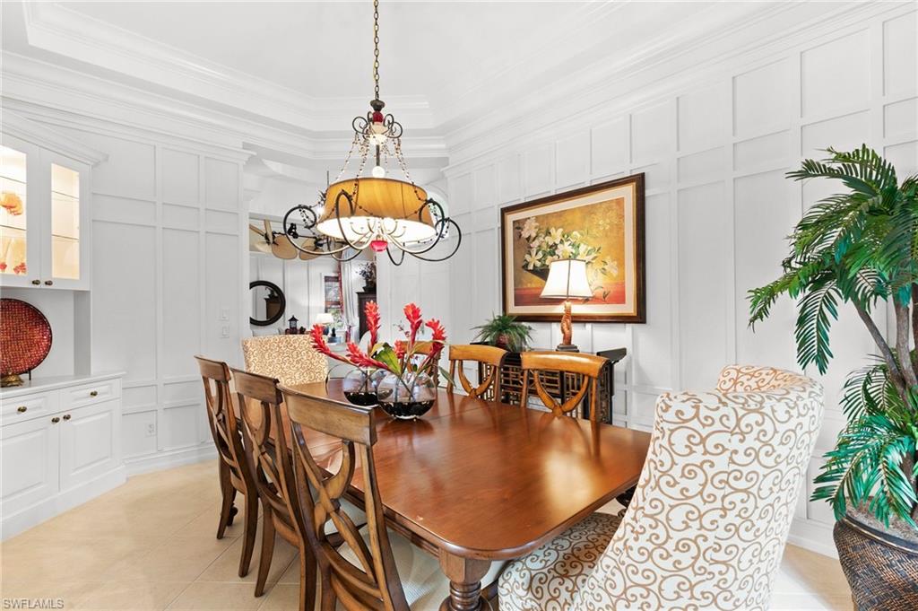 8536 Mallards Way Naples, FL 34114 - Photo 10 of 49 a dining room with furniture and window