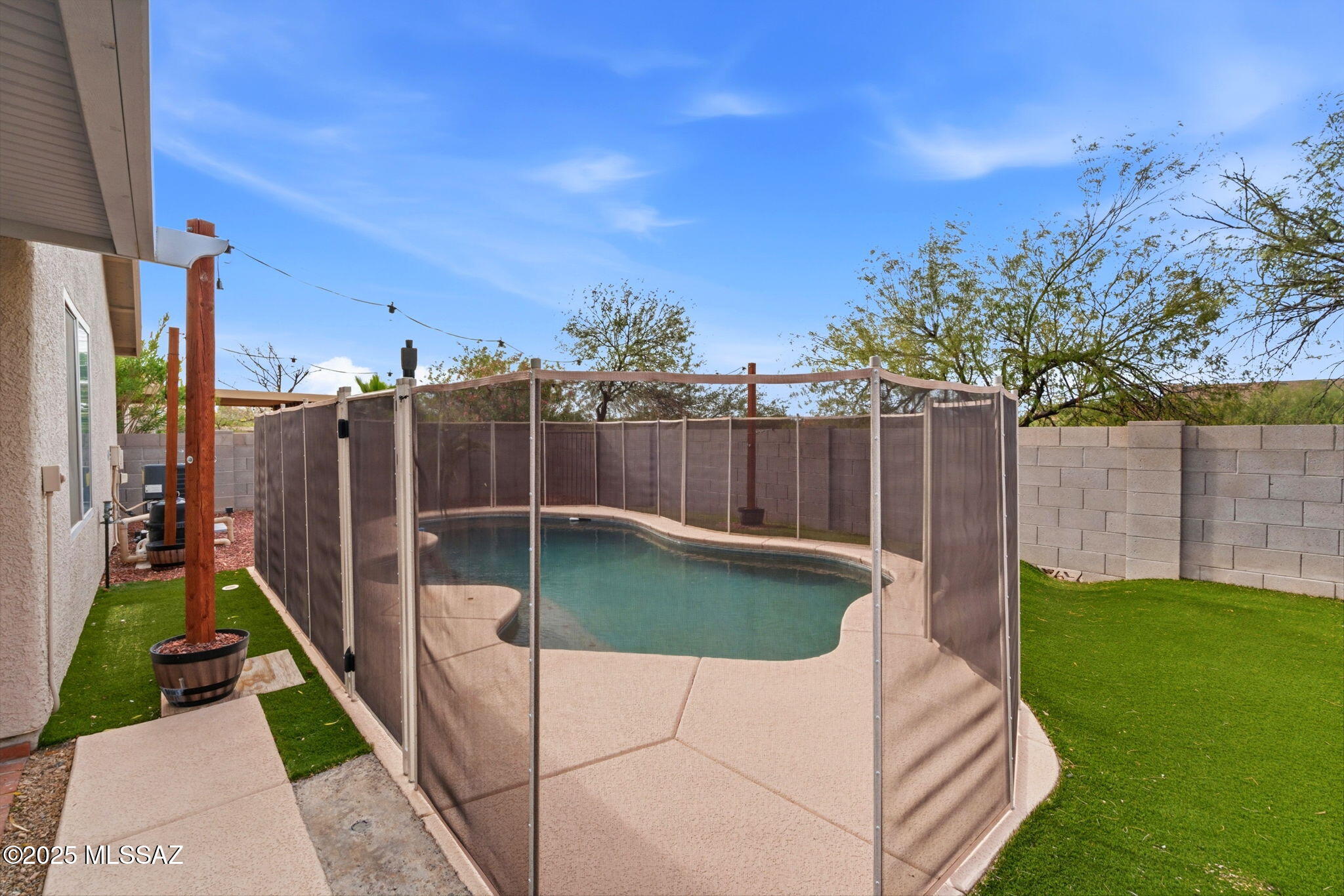 8244 South Lost Mountain Road Tucson, AZ 85747 - Photo 37 of 41 a view of a backyard with sitting area