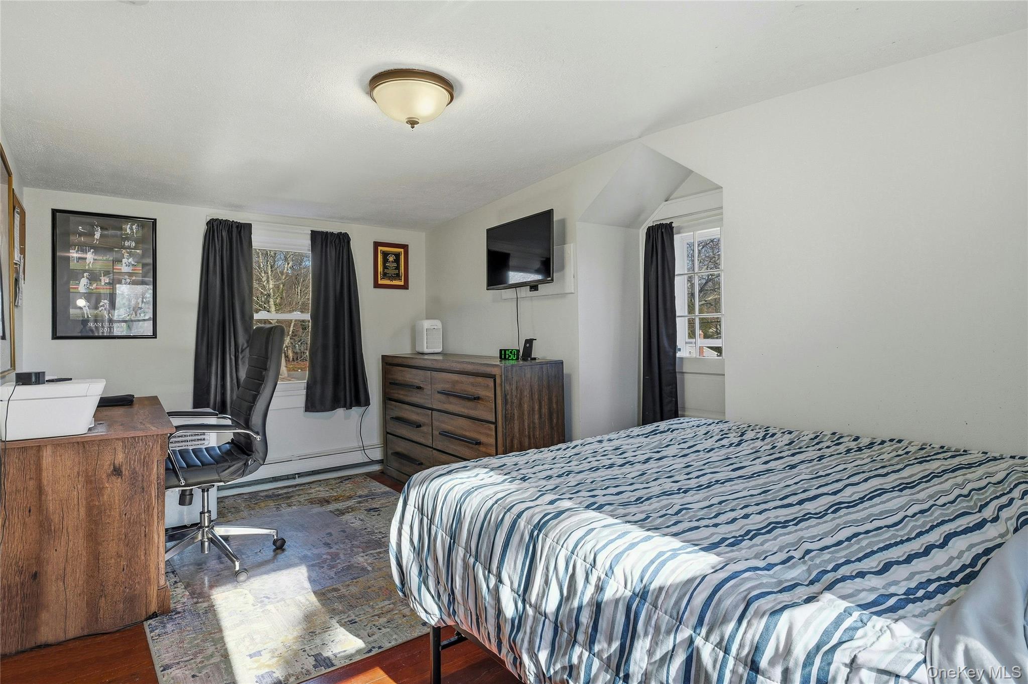 36 Columbine Road Rocky Point, NY 11778 - Photo 21 of 37 a bedroom with a bed and dresser