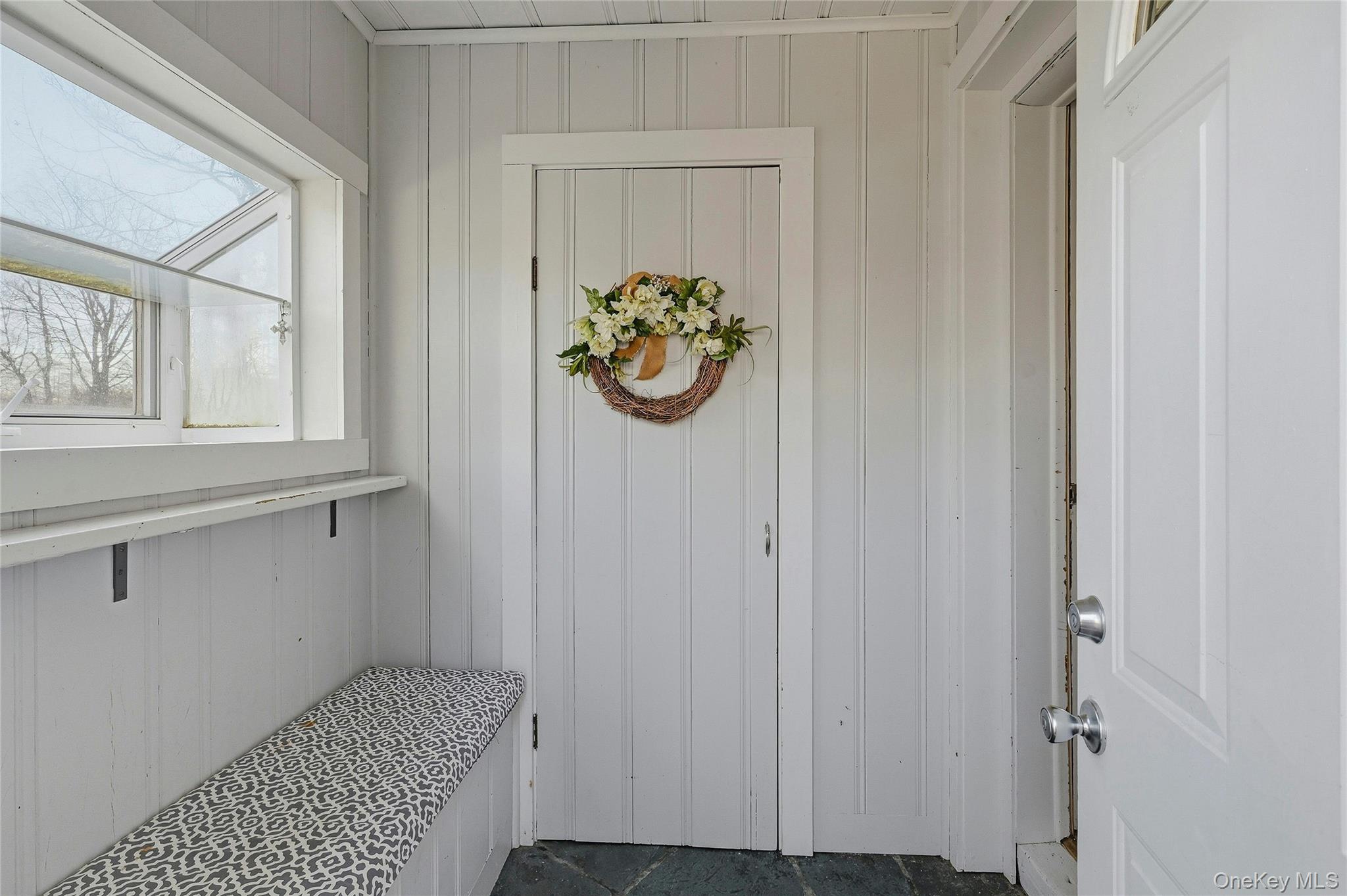 36 Columbine Road Rocky Point, NY 11778 - Photo 8 of 37 a view of room with window and wooden floor