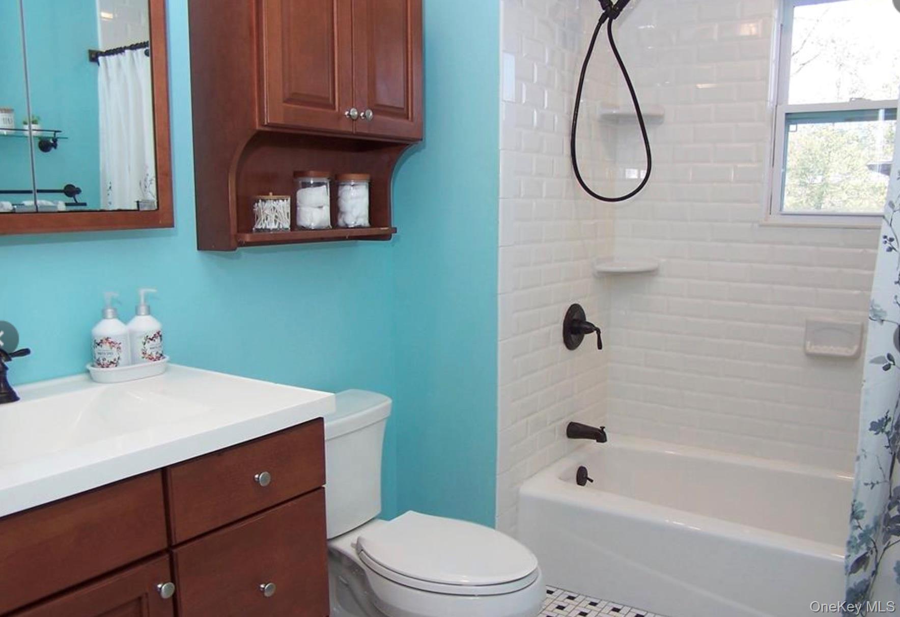 36 Columbine Road Rocky Point, NY 11778 - Photo 8 of 14 Full bathroom with shower / bath combination with curtain and vanity