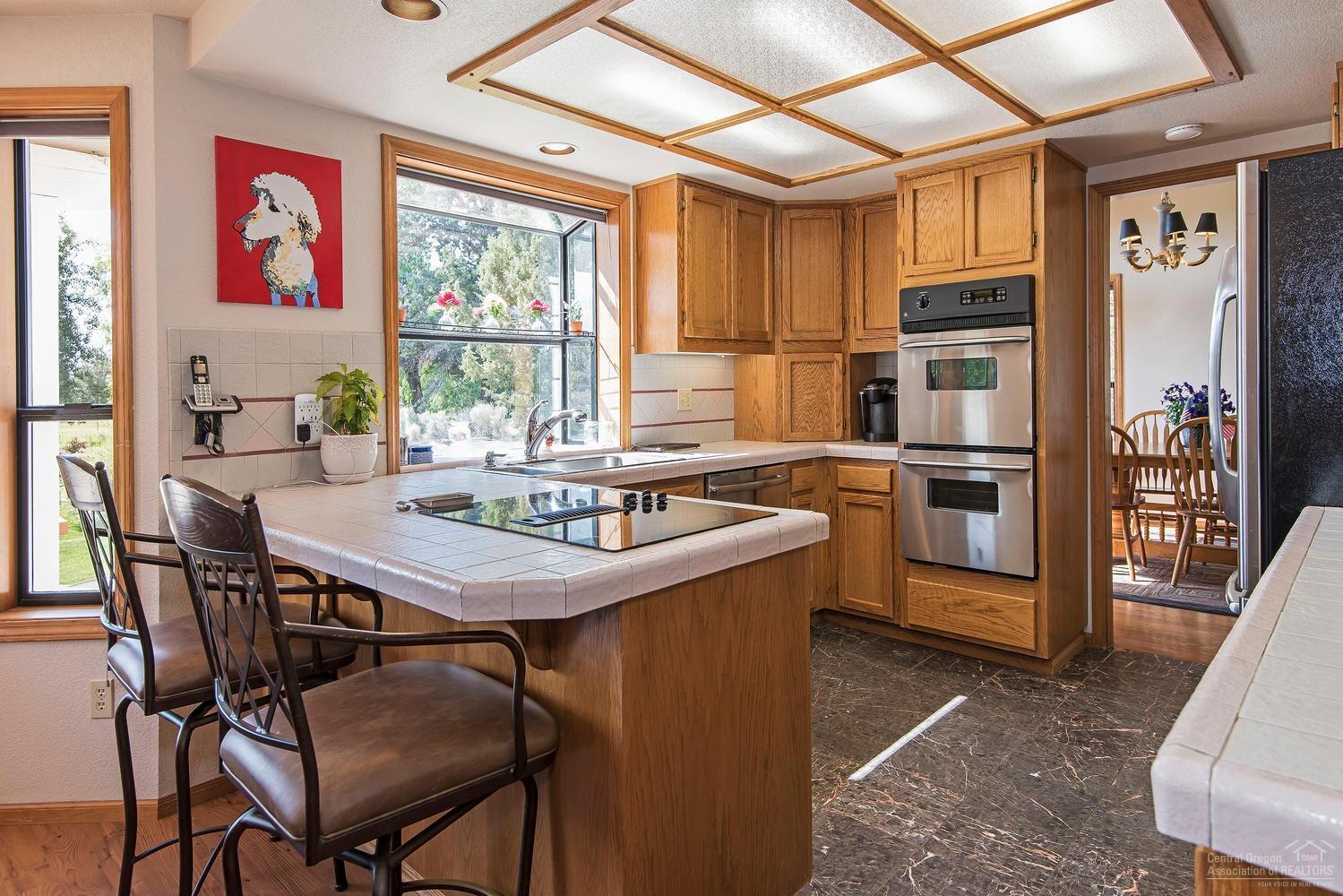 63311 Abbey Rd Bend Bend, OR 97701 - Photo 6 of 25 Kitchen has two ovens, counter cook top,