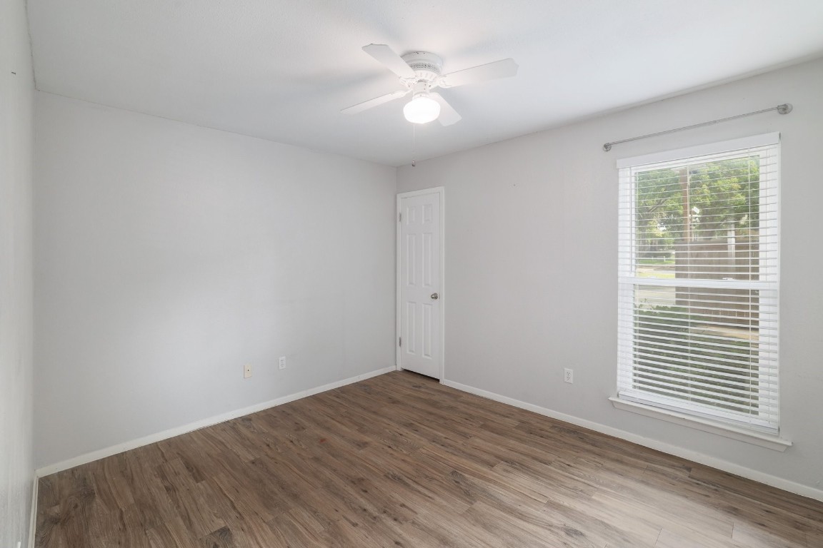 10616 Mellow Meadow Drive, Unit 46A Austin, TX 78750 - Photo 13 of 23 Secondary bedroom, with the door into a good sized closet! Ceiling fan and big window.