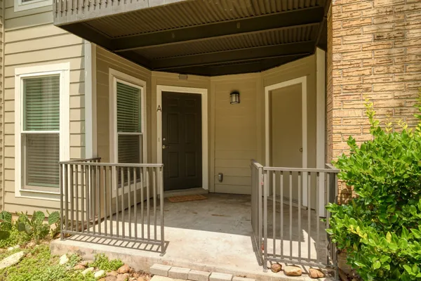 a view of a porch with a small cabin