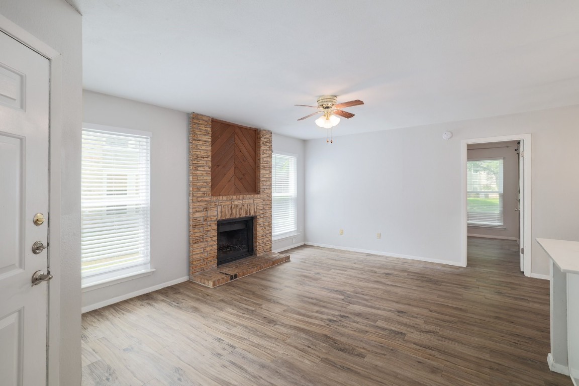 10616 Mellow Meadow Drive, Unit 46A Austin, TX 78750 - Photo 22 of 23 Welcome in! Open floor plan, fireplace in the living room.