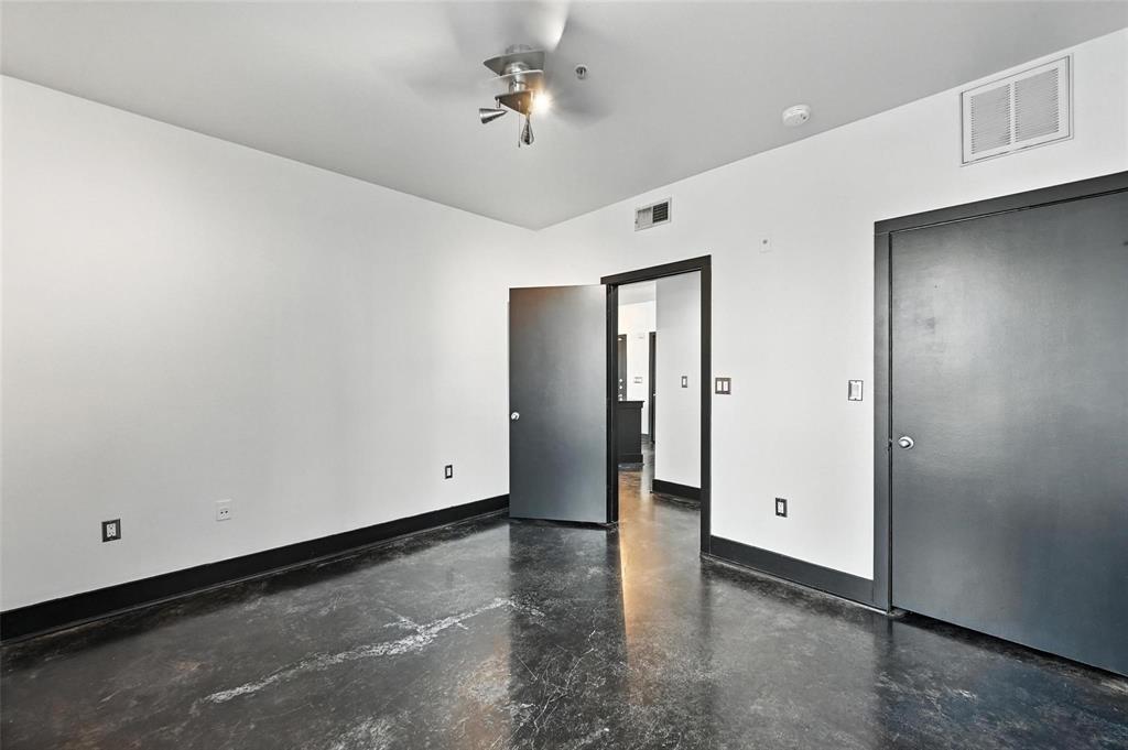 4414 Cedar Springs Road, Unit 124 Dallas, TX 75219 - Photo 8 of 20 a view of an empty room