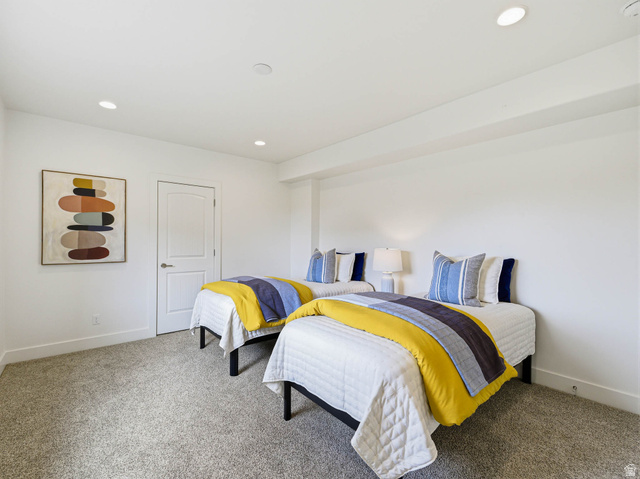 402 Shadow Hill Road Wanship, UT 84017 - Photo 54 of 90 Bedroom with recessed lighting and light colored carpet