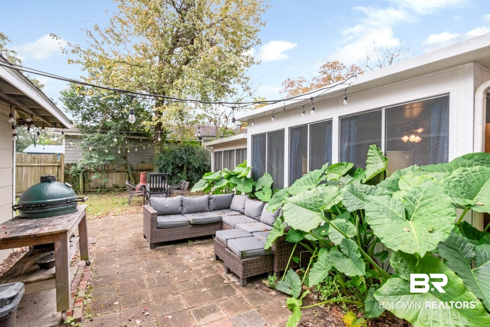 20 Kirby Street Mobile, AL 36607 - Photo 25 of 35 View of patio / terrace featuring a sunroom and an outdoor living space