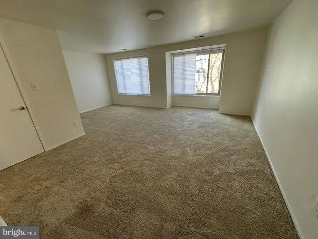 a view of an empty room and window