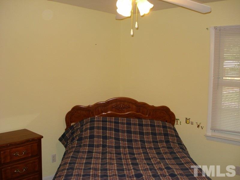 505 Roxanne Drive Raleigh, NC 27603 - Photo 18 of 25 a view of a bedroom