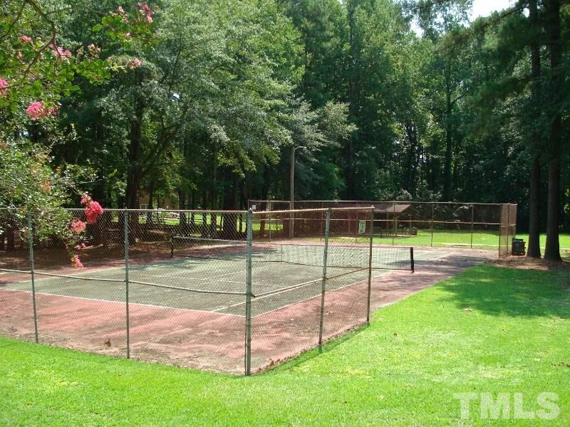 505 Roxanne Drive Raleigh, NC 27603 - Photo 22 of 25 a view of a backyard with swimming pool