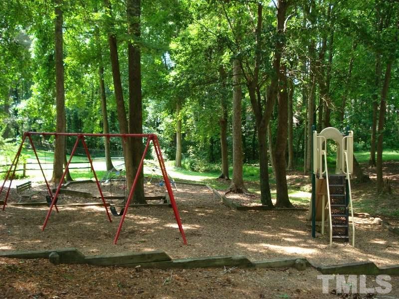 505 Roxanne Drive Raleigh, NC 27603 - Photo 23 of 25 a view of a park with swings