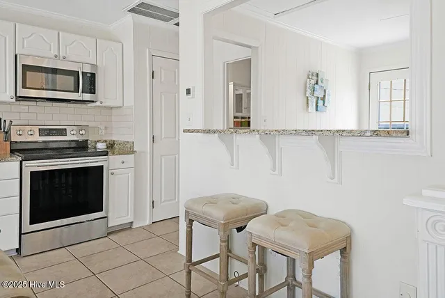 $1,050,000 | 501 Fort Fisher Boulevard South, Unit 6 & 7, Kure Beach, NC 28449