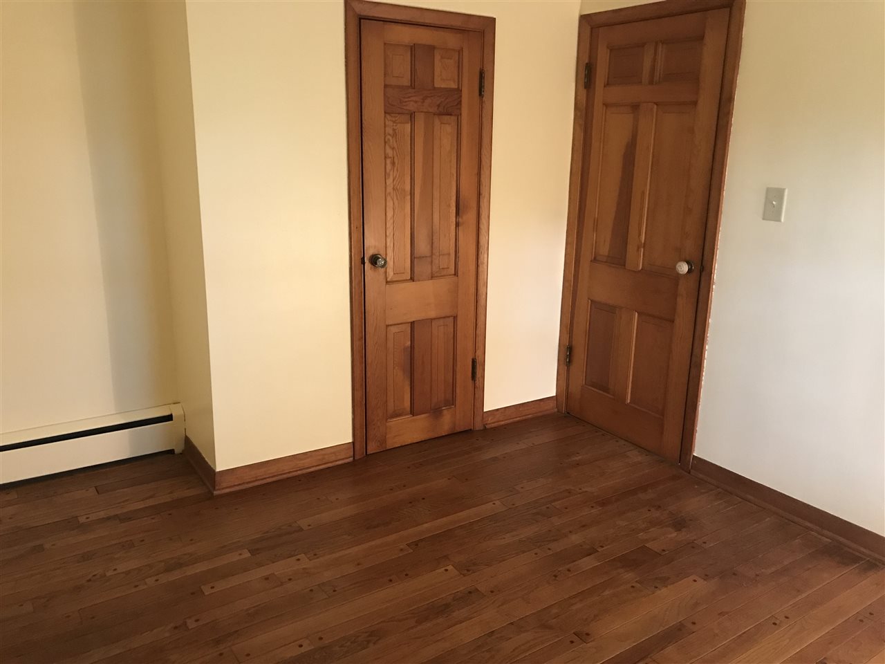 3727 Highcrest Road Rockford, IL 61107 - Photo 13 of 19 an empty room with wooden floor and closet