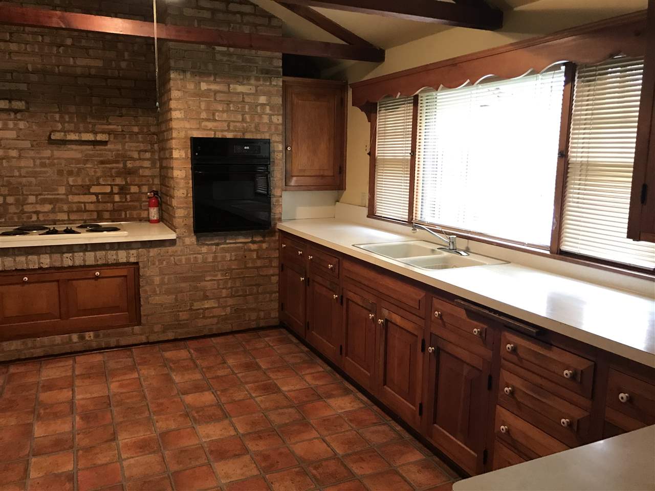 3727 Highcrest Road Rockford, IL 61107 - Photo 5 of 19 a kitchen with stainless steel appliances a sink and a stove