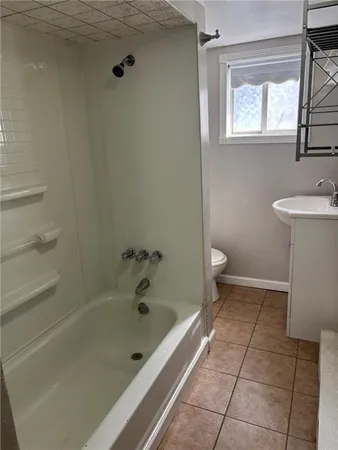 a car parked in front of a house