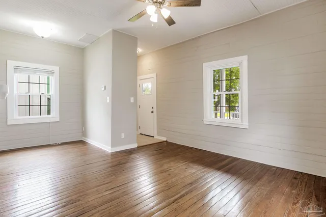 a view of a kitchen from the hallway